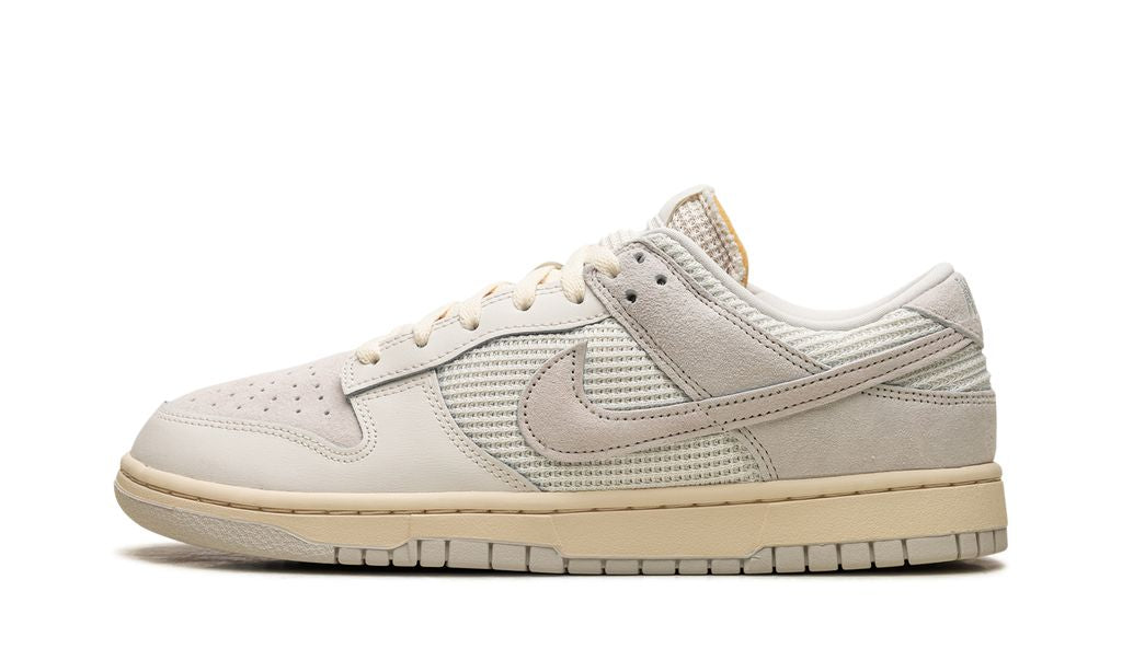 NK Dunk Low Light Bone